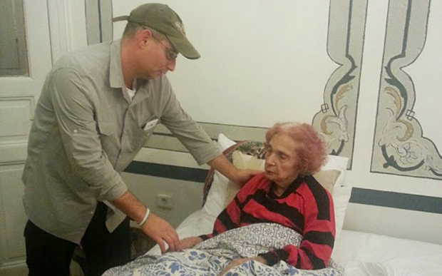 Mariam Halabi in a clinic in Istanbul with Moti Kahana, who arranged her evacuation