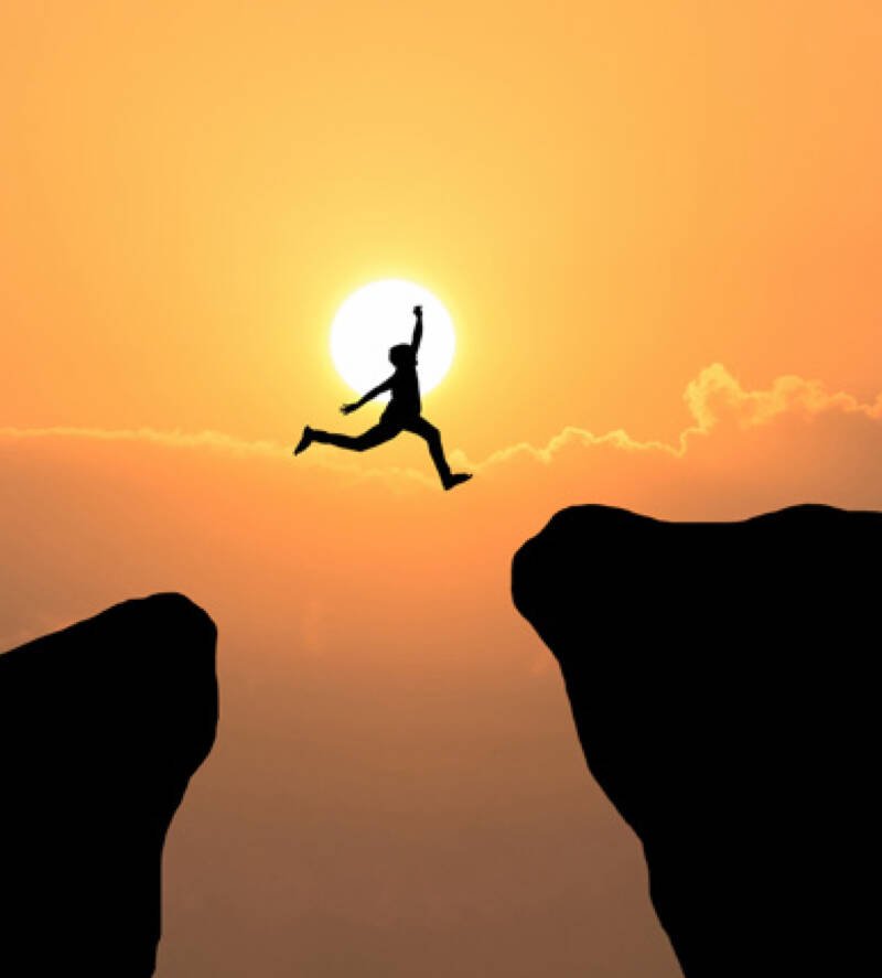 leap of faith silhouette cliff jump danger risk hope sunset